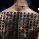 Miyavi's back is covered with the Heart Sutra.
